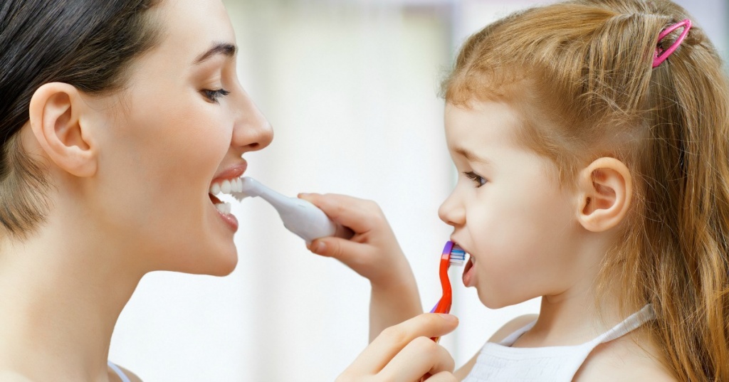 Child-to-Brush-Moms-Teeth.jpg